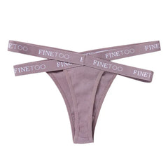 Purple ribbed thong with 'FINETOOL' waistbands on a white background