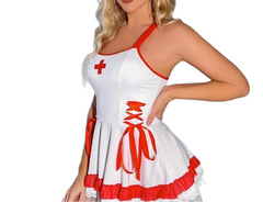 Woman wearing a white and red nurse costume on a white background