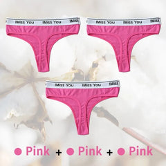 Three pairs of pink thongs with 'I Miss You' waistbands on a white background.