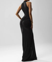 Woman wearing a black evening gown on a white background