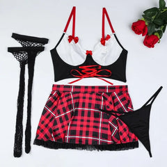 Black and red lingerie set with plaid skirt, black stockings, and roses on a white background