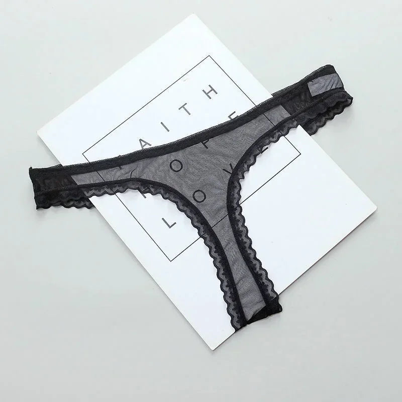Black lace thong on a white background