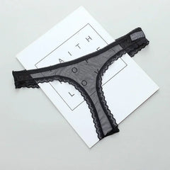 Black lace thong on a white background