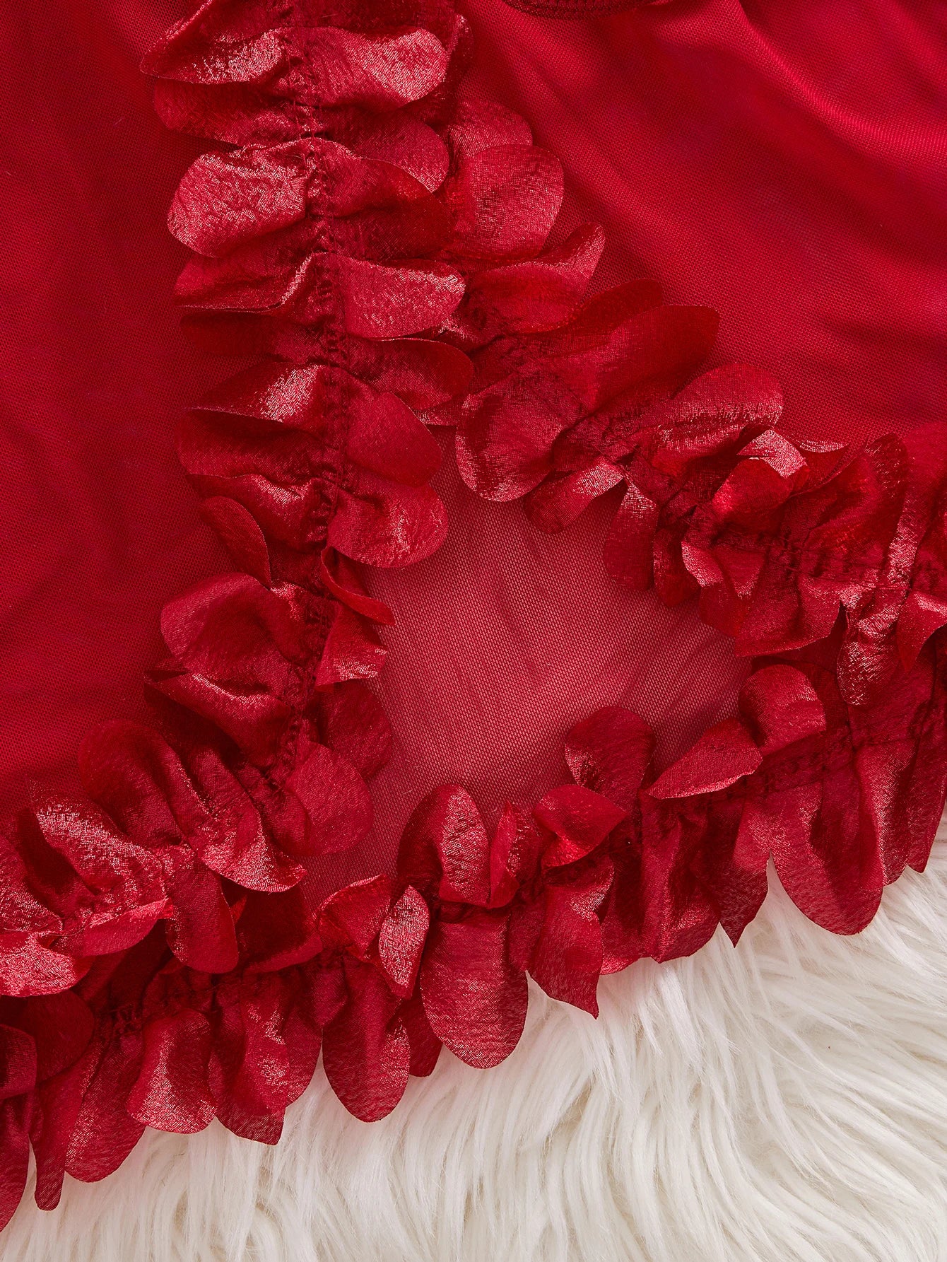 Close-up of a red flower with a white center