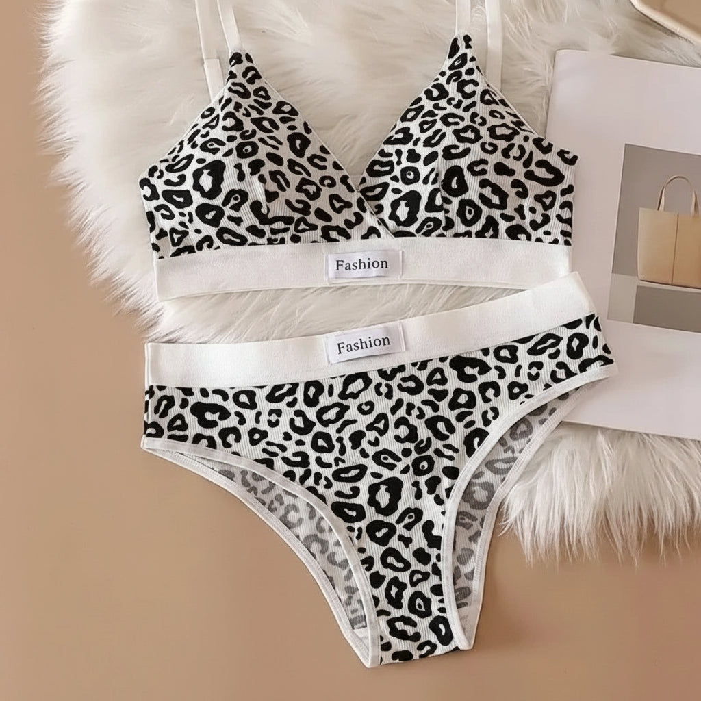Leopard print bra and panties set on a beige background