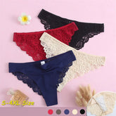Four pairs of lace-trimmed panties in different colors on a pink background.