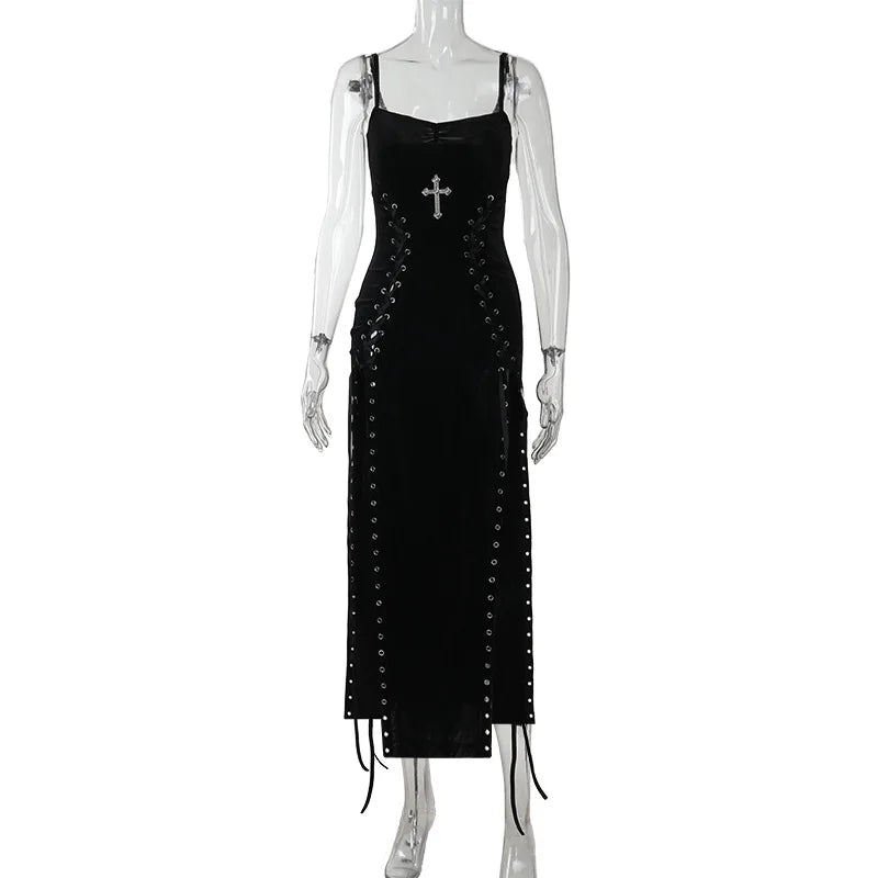 Black dress with a cross detail on a mannequin against a white background