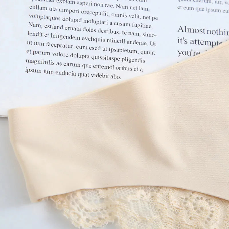 Close-up of a beige fabric over a book with text.