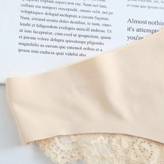 Close-up of a beige fabric over a book with text.