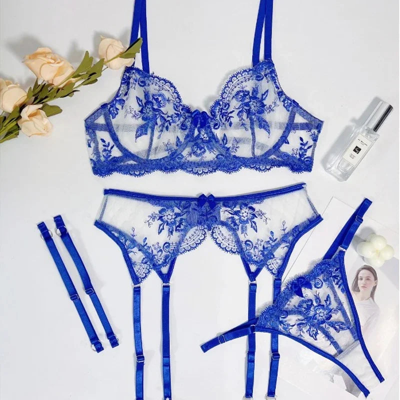 Blue lace lingerie set with floral designs on a white background.
