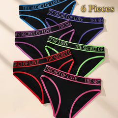 Black underwear with colorful waistbands labeled 'The Secret of Love' on a beige background