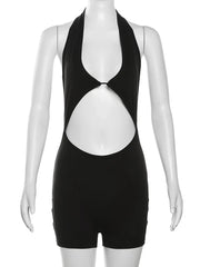 Black halter neck romper on a mannequin with 'WeirdPuss' branding.