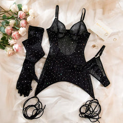 Black lingerie set with star pattern on a light background
