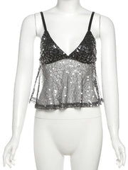 Black sequin top on a mannequin against a white background