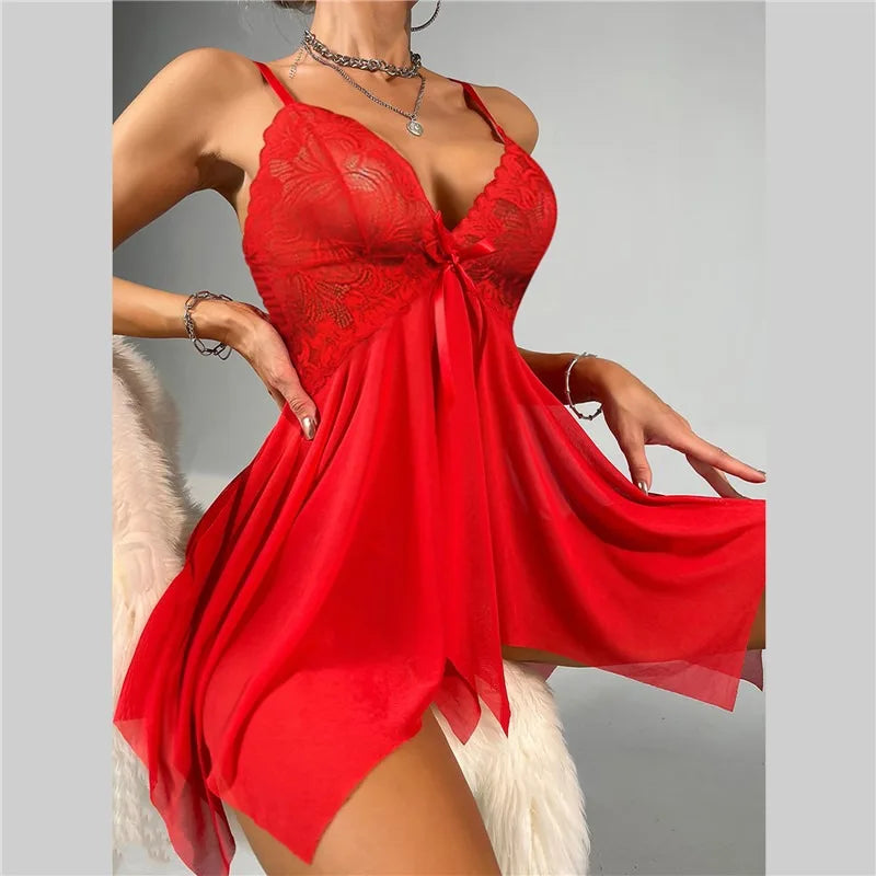 Red lace dress with sheer overlay on a neutral background