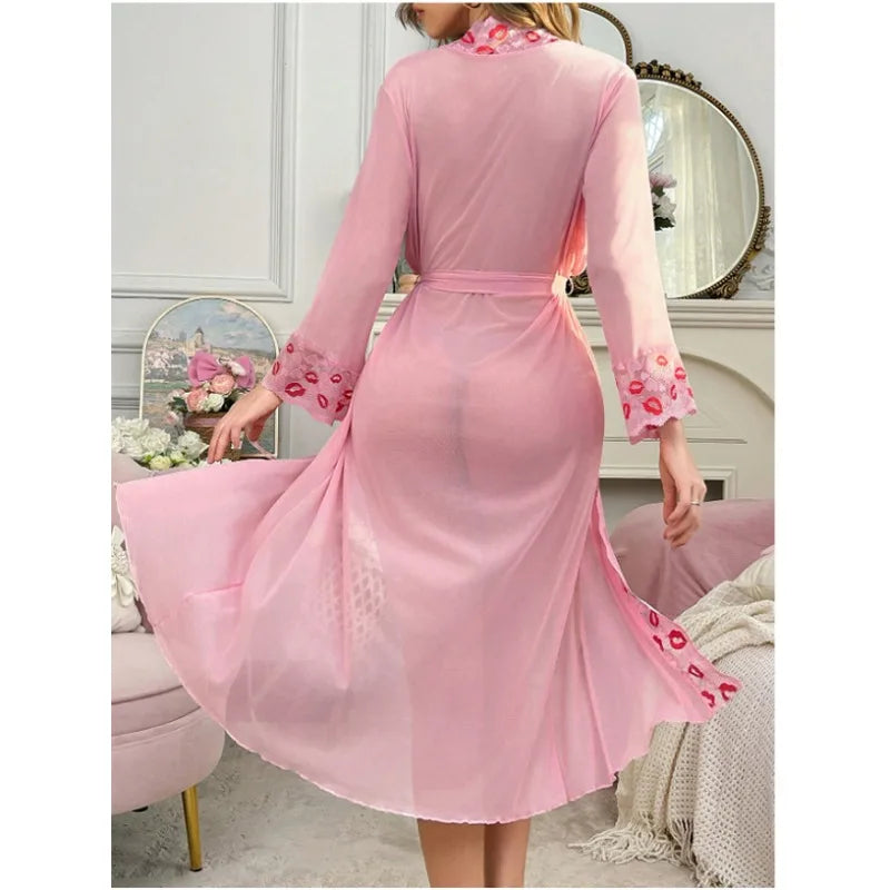 Pink dress with floral embellishments in a room setting