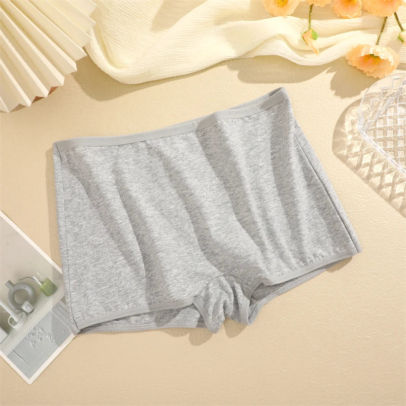 Gray underwear on a beige surface with a soft focus background