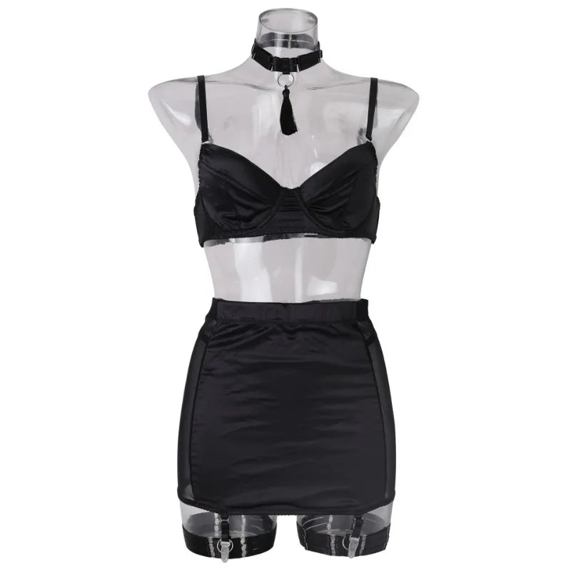 Black lingerie set on a transparent mannequin against a white background