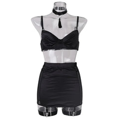 Black lingerie set on a transparent mannequin against a white background