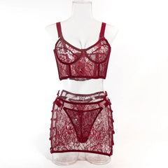 Red lace lingerie set on a mannequin against a white background