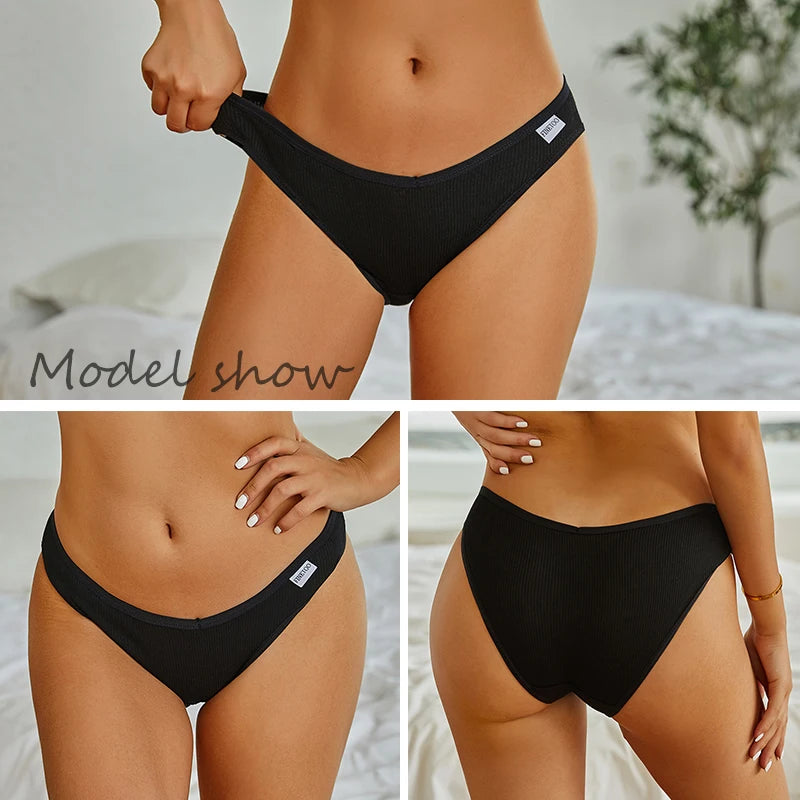 Black bikini bottom worn by a model on a neutral background