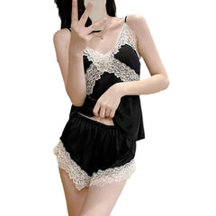 Black lace pajama set on a white background