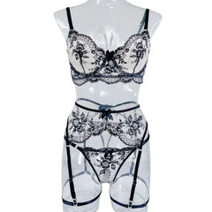 Lace lingerie set on a mannequin against a white background