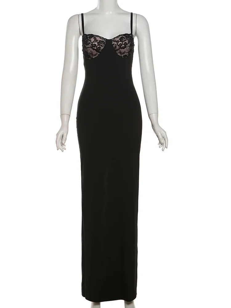 Black evening gown with lace detailing on a mannequin against a white background