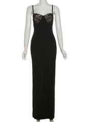 Black evening gown with lace detailing on a mannequin against a white background