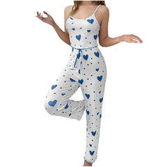 White romper with blue heart patterns on a white background