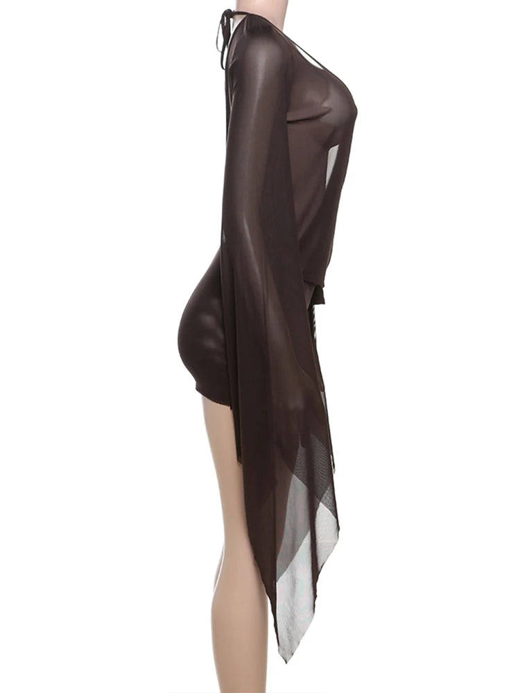 Brown sheer dress on a mannequin against a white background