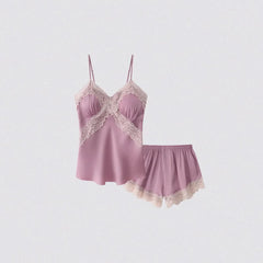 Pink lace lingerie set on a light gray background