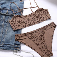 Leopard print top and underwear set with denim jacket on a white background