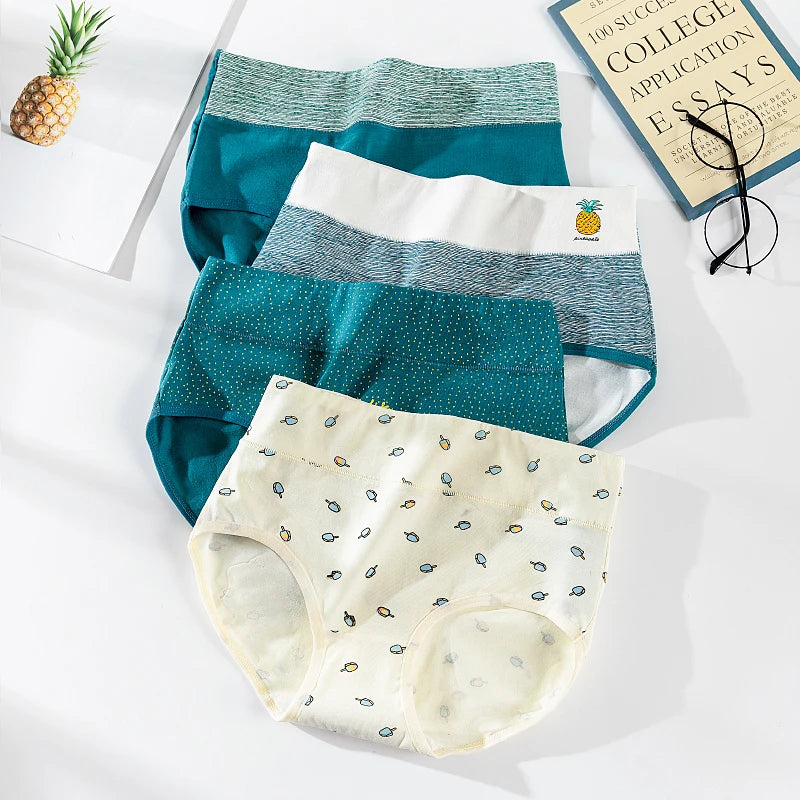 Four pairs of underwear in teal and white with pineapple design on a light background.