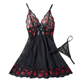 Black lace nightgown with red accents on a white background
