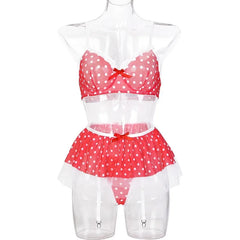 Red polka dot lingerie set on a mannequin against a white background