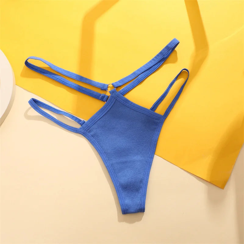 Blue bikini bottom on a yellow and beige background