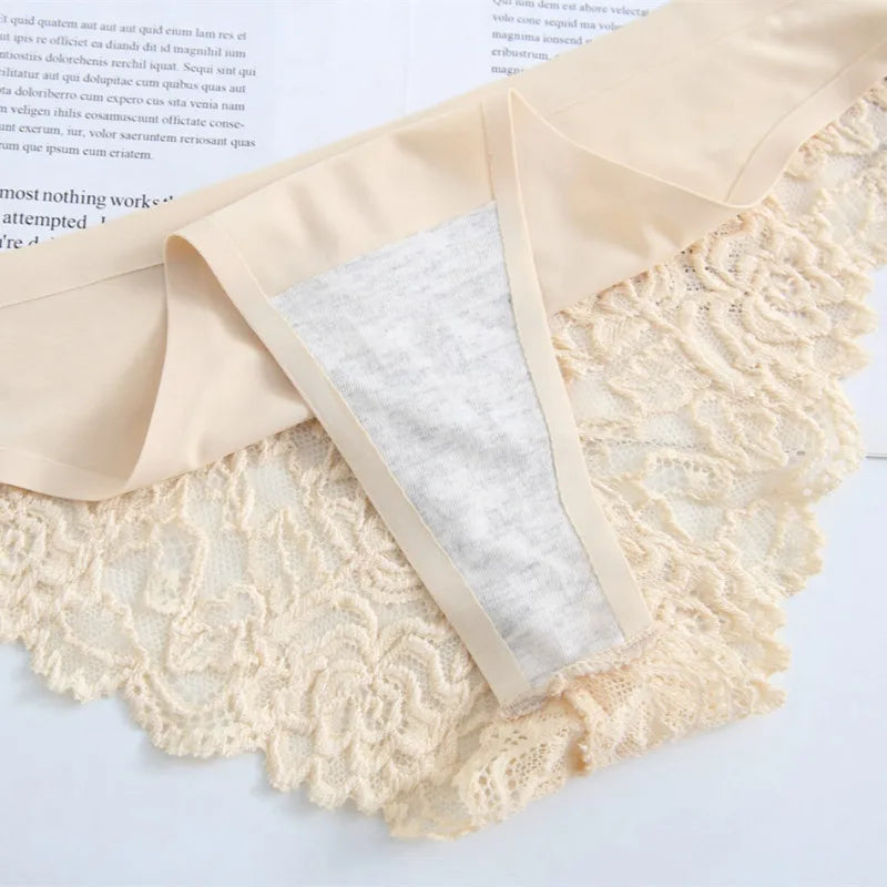 Beige lace fabric with a white square inside on a light blue background