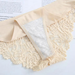Beige lace fabric with a white square inside on a light blue background
