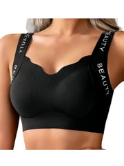 Black sports bra with 'BEAUTY' straps on a white background