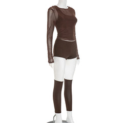 Mannequin wearing a brown outfit with sheer sleeves on a white background