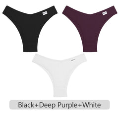 Three pairs of men's underwear in black, deep purple, and white on a light gray background.