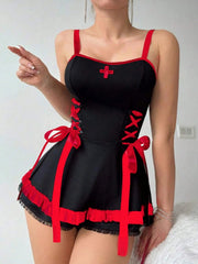 Black and red dress with cross design on a plain background