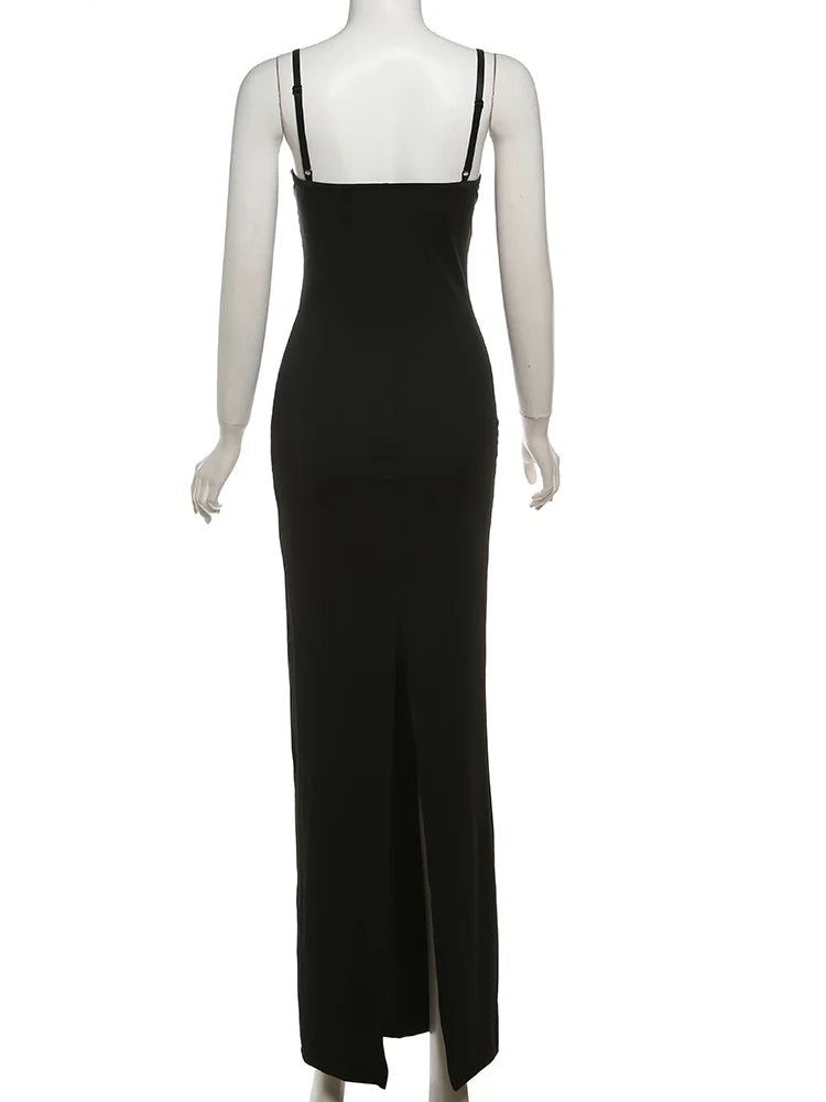Black dress on a mannequin with 'WeirdPuss' branding.