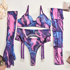Multicolored sports bra and leggings set on a white background