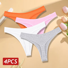 Four pairs of women's underwear in orange, pink, white, and gray on a beige background with tulips.