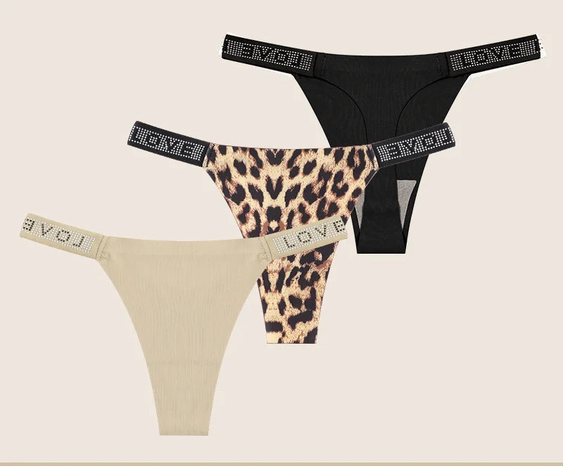 Two pairs of women's panties with leopard print and beige designs on a beige background.