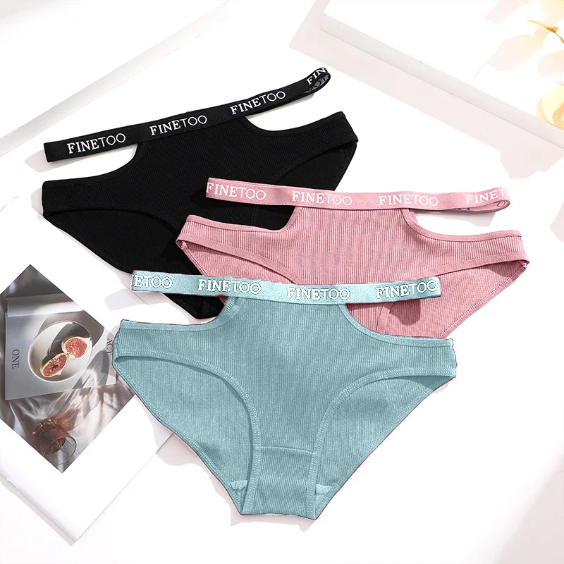 Three pairs of women's underwear with 'FINEtoo' branding on the waistbands.