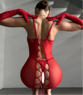 Person wearing a red lace-up bodysuit with 'TOUCHEART' branding.