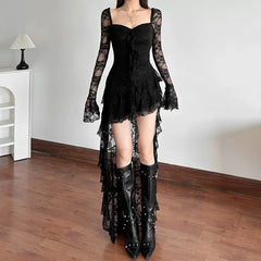 Black lace dress with long sleeves and high-low hem on a white background